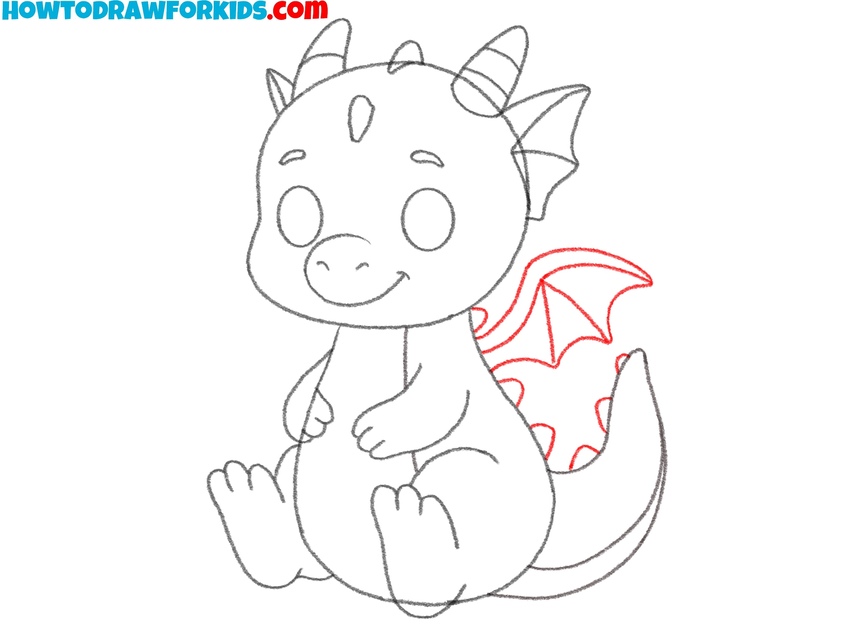 Sketch the wing and spikes