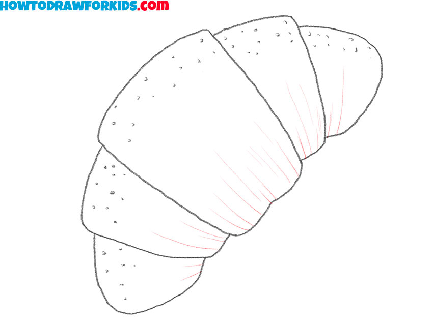 Draw the croissant’s curved fold lines