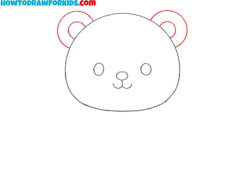 Sketch the ears at the top of the head