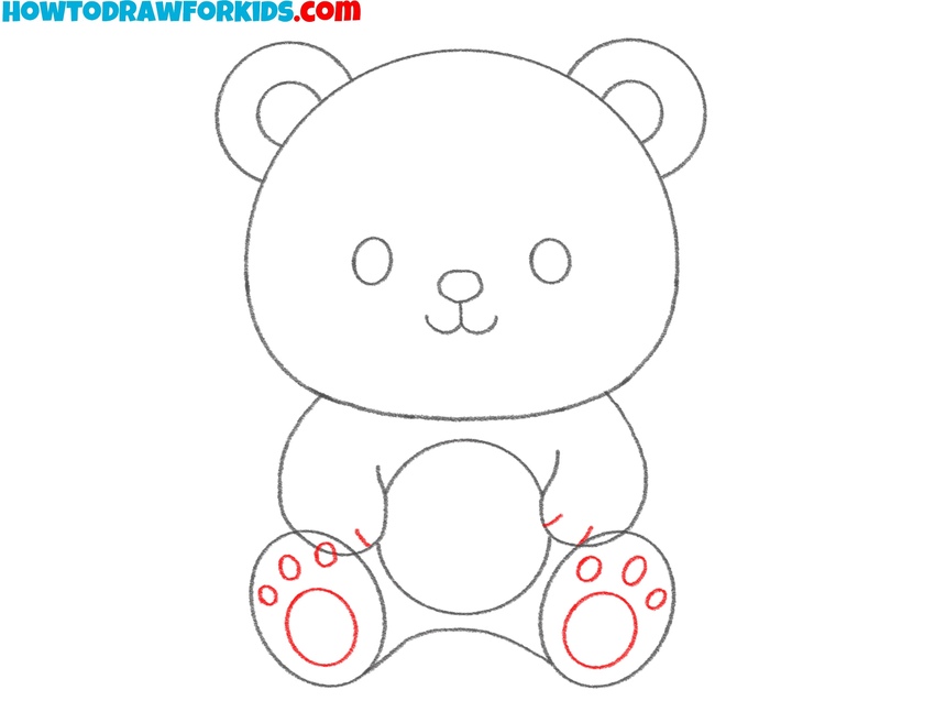 Draw the small pads on the paws