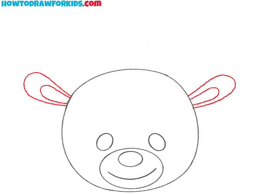 Sketch the ears on the sides of the head