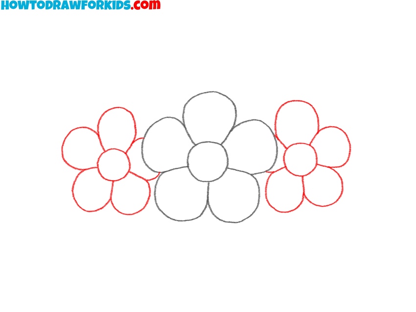 Sketch additional flowers next to the center