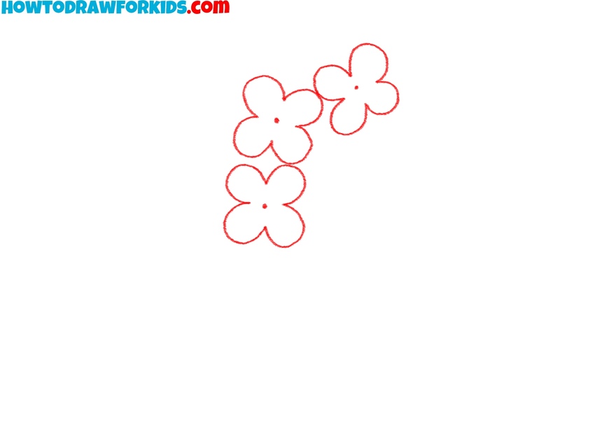 Sketch the first blossom shapes