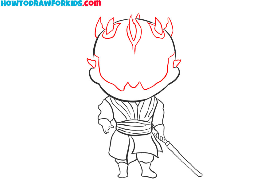 Add the horns on top of the head