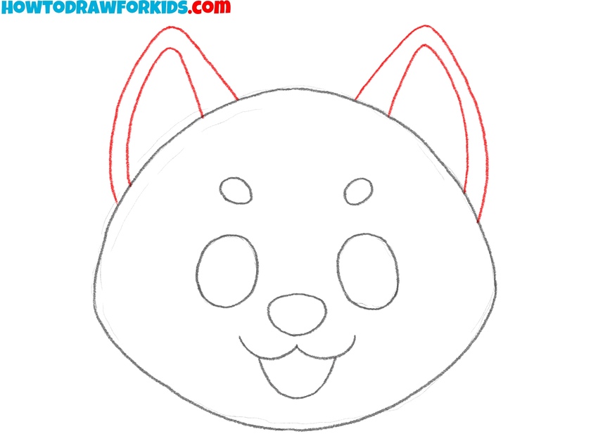 Draw the ears of the dog