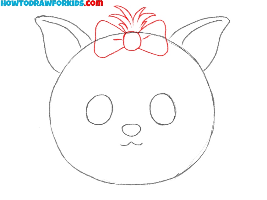 Draw the bow at the top the Yorkie face