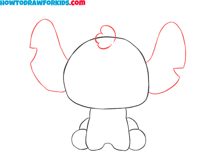 Draw the ears and tuft on the head